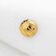 A single gold-colored basketball pin is centered against a white background.