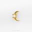 A gold-colored crescent moon-shaped earring with a white opal stone in the center.